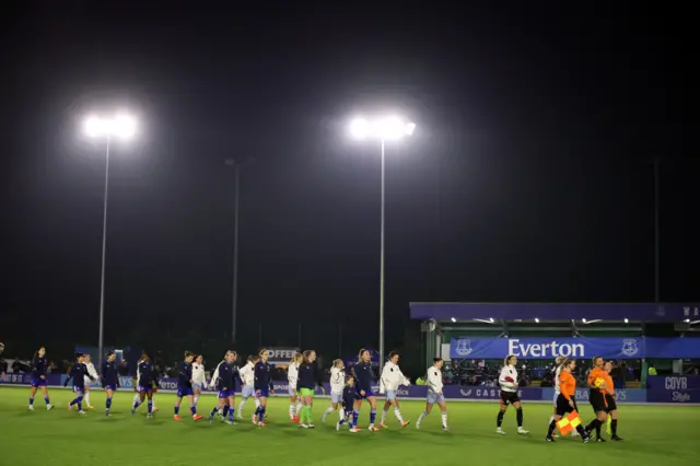 Players walk out