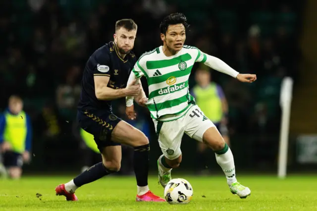 Celtic's Reo Hatate and Kilmarnock's Liam Polworth in action during a Scottish Gas Men's Scottish Cup Fourth Round match between Celtic and Kilmarnock at Celtic Park, on January 18, 2025, in Glasgow, Scotland. (Photo by Craig Foy / SNS Group)