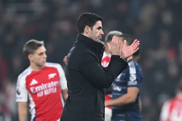 Mikel Arteta, Manager of Arsenal, applauds the fans