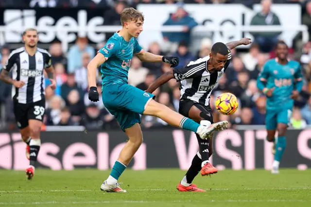 Dean Huijsen of AFC Bournemouth and Alexander Isak