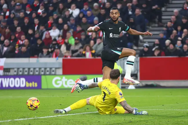 Cody Gakpo of Liverpool is challenged by Mark Flekken