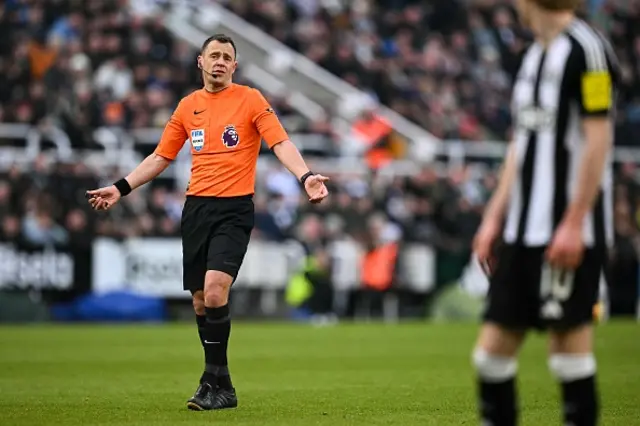 Referee Stuart Attwell reacts