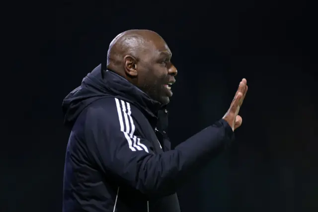 Shaun Goater waves instructions from the touchline