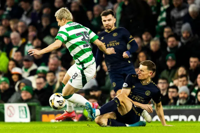 Kilmarnock's Lewis Mayo tackles Celtic's Daizen Maeda during a Scottish Gas Men's Scottish Cup Fourth Round match between Celtic and Kilmarnock at Celtic Park, on January 18, 2025, in Glasgow, Scotland. (Photo by Craig Foy / SNS Group)