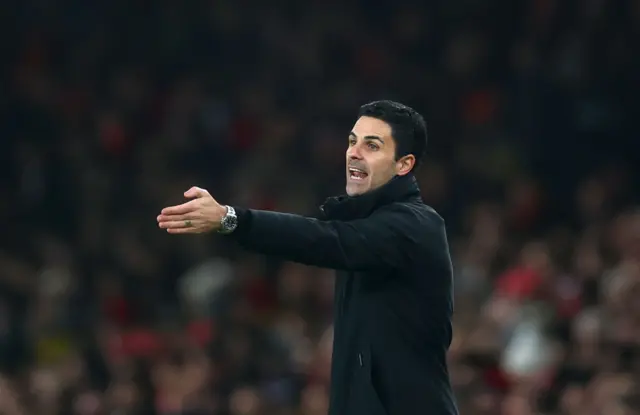 Mikel Arteta, Manager of Arsenal, gives the team instructions.