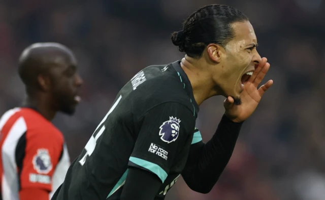 Liverpool's Virgil van Dijk reacts