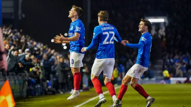 Matt Ritchie celebrates in front of the Portsmouth fans