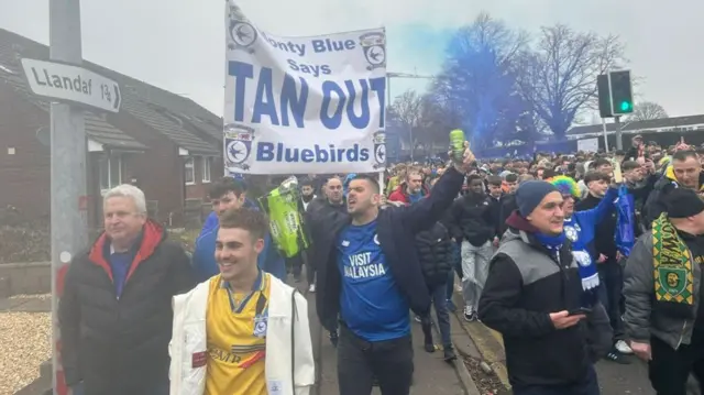 Cardiff fans on a protest march before the Swansea game