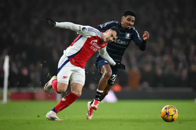 Gabriel Martinelli of Arsenal is fouled by Ian Maatsen.