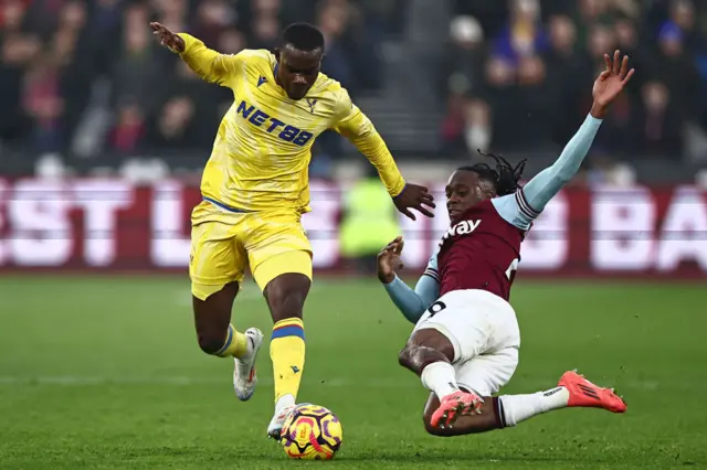 Tyrick Mitchell (L) vies with West Ham United's English defender #29 Aaron Wan-Bissaka