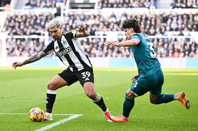 Milos Kerkez and Bruno Guimaraes battle for the ball