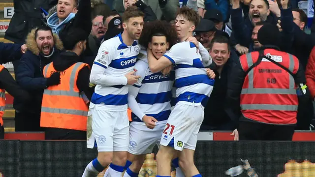 QPR's players celebrate scoring the winning goal against Plymouth