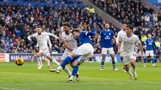 Calum Chambers has a shot at goal against Swansea