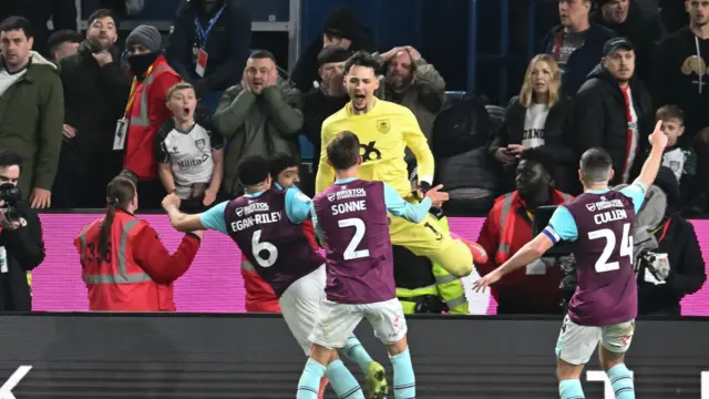 Burnley's James Trafford celebrates saving a penalty against Sunderland