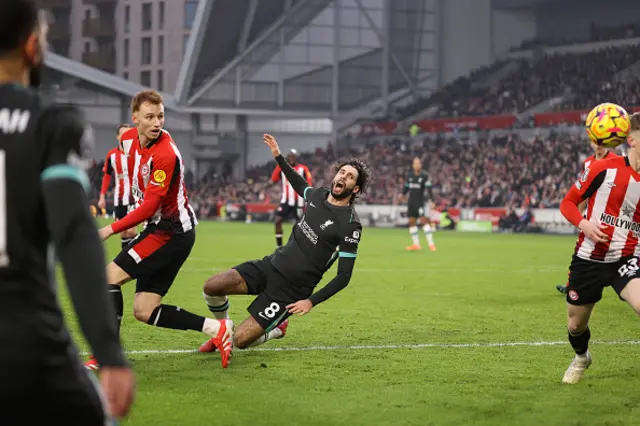 Dominik Szoboszlai of Liverpool heads the ball