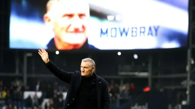 Tony Mowbray waves to the crowd at The Hawthorns