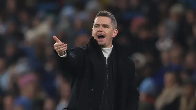 Marc Skinner, Manager of Manchester United, looks on during the Barclays Women's Super League match between Manchester City and Manchester United