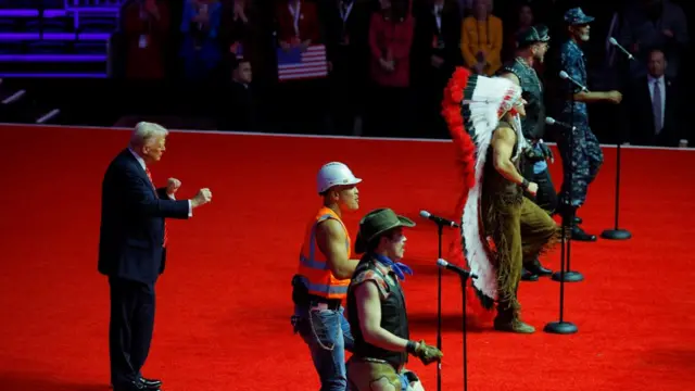 Trump dances while the Village People sing the YMCA on stage