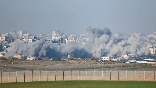 Smoke rises from an explosion in northern Gaza