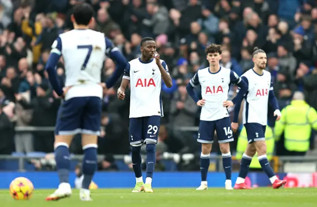 Pape Matar Sarr and his teammates show dejection