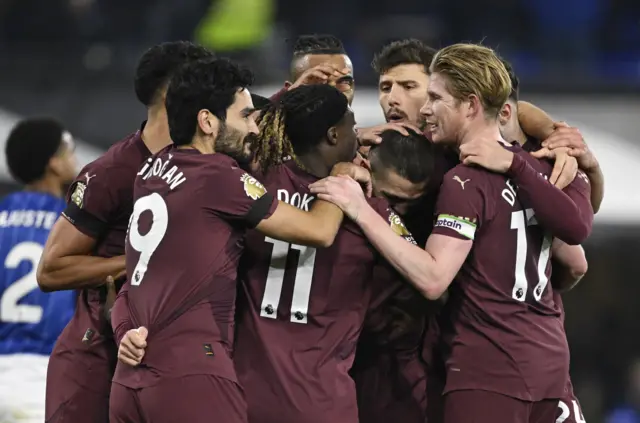 Manchester City's Mateo Kovacic celebrates scoring their second goal with teammates.