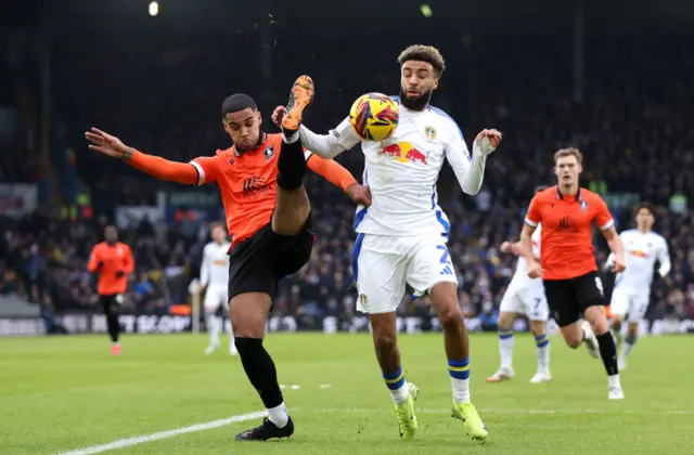 Sheffield Wednesday's Max Lowe and Jayden Bogle challenge for the ball