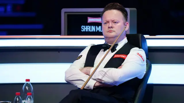 Shaun Murphy sits in his chair