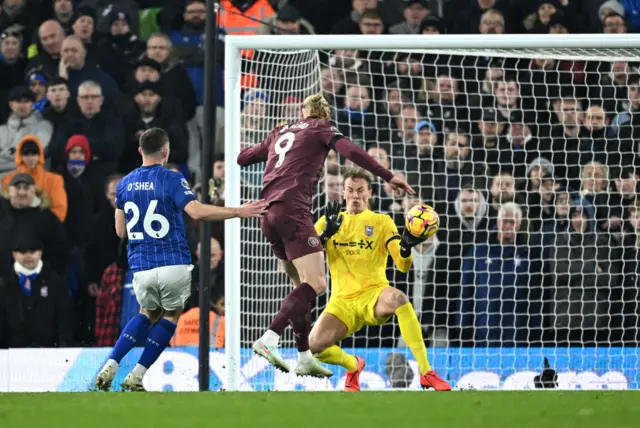 Erling Haaland of Manchester City misses a chance.