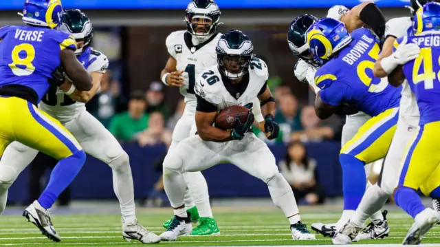 Saquon Barkley runs the ball for the Philadelphia Eagles at the Los Angeles Rams