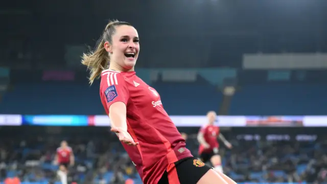 Ella Toone of Manchester United celebrates scoring her team's fourth goal during the Barclays Women's Super League match between Manchester City and Manchester United