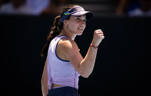 Eva Lys celebrates beating Jaqueline Cristian at the Australian Open