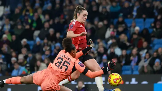 Manchester United's Ella Toone scores their fourth goal to complete her hat-trick