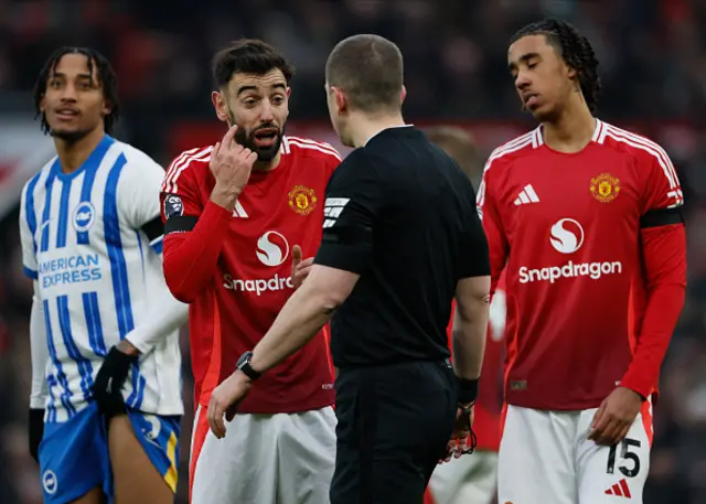 Bruno Fernandes of Manchester United complains to Referee Peter Bankes