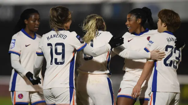 Chelsea celebrate after their team's fifth goal during the Barclays Women's Super League Match between West Ham United v Chelsea