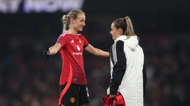 Millie Turner of Manchester United (L) celebrates with teammate Ella Toone after the Barclays Women's Super League match between Manchester City and Manchester United at Etihad Stadium