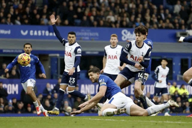 Everton's James Tarkowski in action with Tottenham Hotspur's Archie Gray