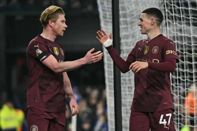 Manchester City's English midfielder #47 Phil Foden celebrates with Manchester City's Belgian midfielder #17 Kevin De Bruyne.