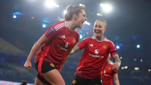 Ella Toone of Manchester United scores her team's first goal during the Barclays Women's Super League match between Manchester City and Manchester United