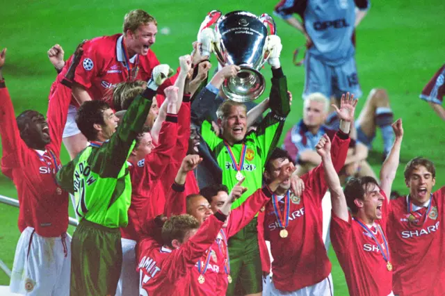 Manchester United celebrate winning the 1999 Champions League trophy