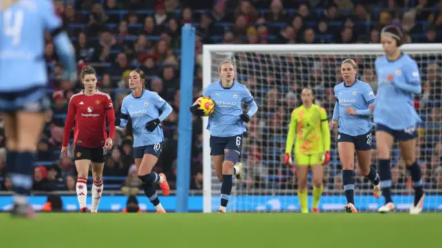 Vivianne Miedema of Manchester City celebrates scoring her team's first goal during the Barclays Women's Super League match between Manchester City and Manchester United