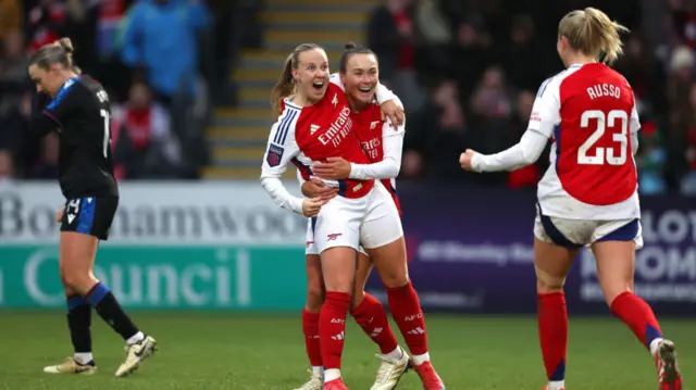 Beth Mead of Arsenal celebrates scoring her team's third goal with Caitlin Foord and Alessia Russo during the Barclays Women's Super League match between Arsenal FC and Crystal Palace