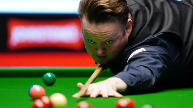 Shaun Murphy plays a shot