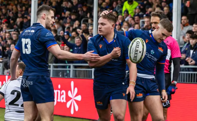 Paddy Harrison is congratulated after scoring Edinburgh's fifth