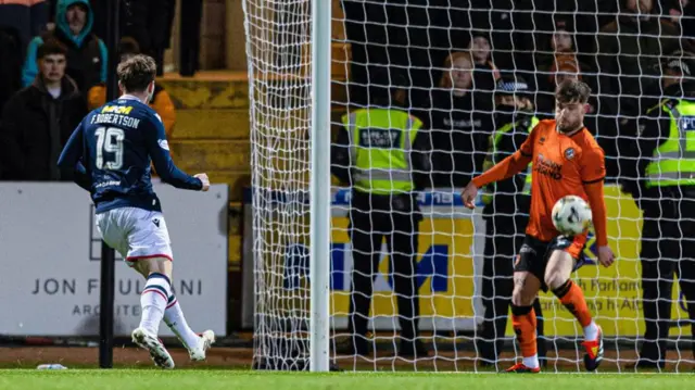 DUNDEE, SCOTLAND - JANUARY 02: Dundee United's Ryan Strain (R) blocks a shot on the goal line from Dundee's Finlay Robertson during a William Hill Premiership match between Dundee and Dundee United at the Scot Foam Stadium at Dens Park, on January 02, 2025, in Dundee, Scotland.  (Photo by Ewan Bootman / SNS Group)