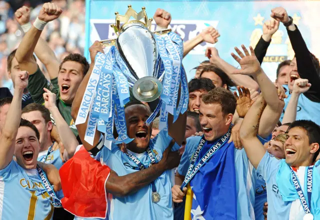 Vincent Kompany lifting the Premier League title for Manchester City in 2012