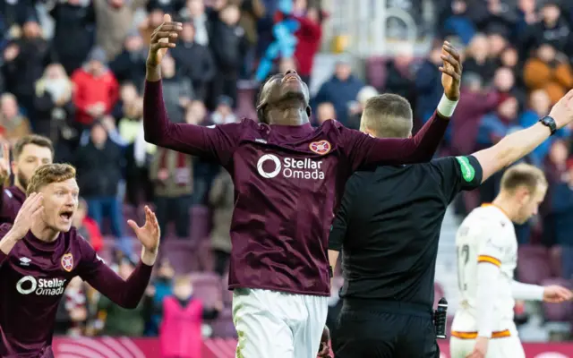 Hearts' Musa Drammeh reacts as there is a VAR check following his goal during a William Hill Premiership match between Heart of Midlothian and Motherwell at Tynecastle Park,