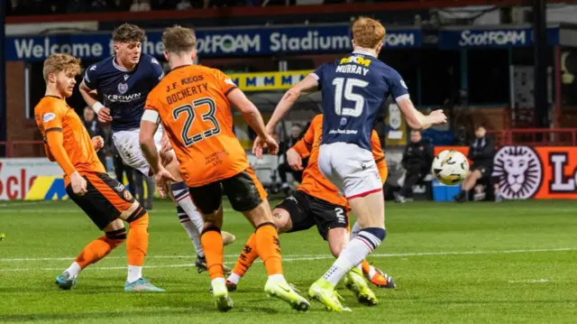 DUNDEE, SCOTLAND - JANUARY 02: Dundee's Seb Palmer-Houlden has a shot during a William Hill Premiership match between Dundee and Dundee United at the Scot Foam Stadium at Dens Park, on January 02, 2025, in Dundee, Scotland.  (Photo by Ross Parker / SNS Group)