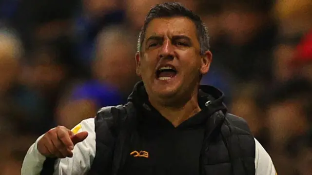 Nelson Jardim instructing his Newport County team from the dugout