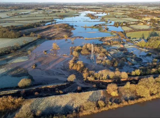 A drone view shows flooding and a land slip after part of the Bridgewater Canal embankment collapsed