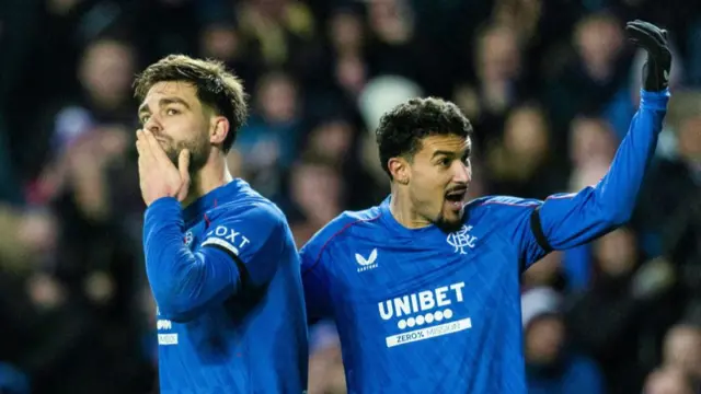 GLASGOW, SCOTLAND - JANUARY 02: Rangers' Robin Propper (L) celebrates making it 2-0 with Jefte during a William Hill Premiership match between Rangers and Celtic at Ibrox Stadium, on January 02, 2025, in Glasgow, Scotland.  (Photo by Craig Foy / SNS Group)